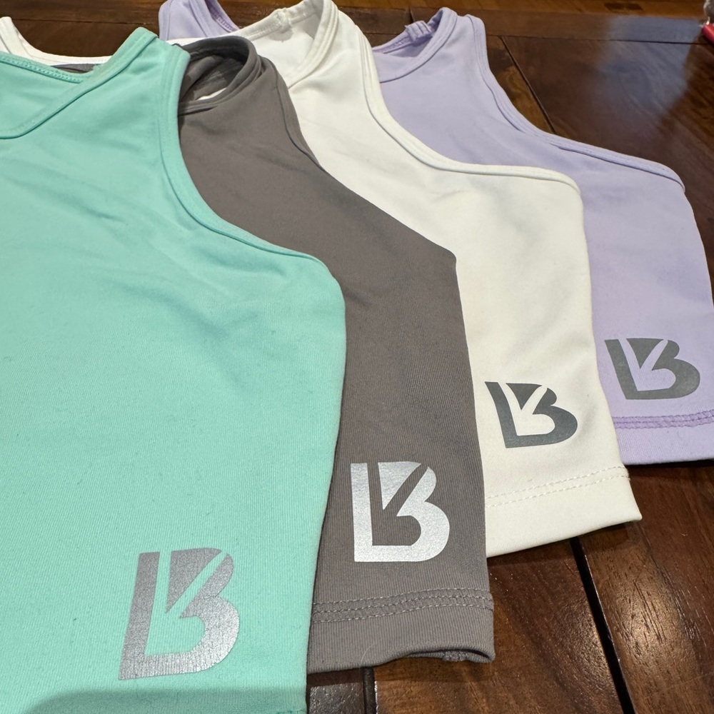 Lot of 4 Buffy bunny crop tank tops. Size medium.